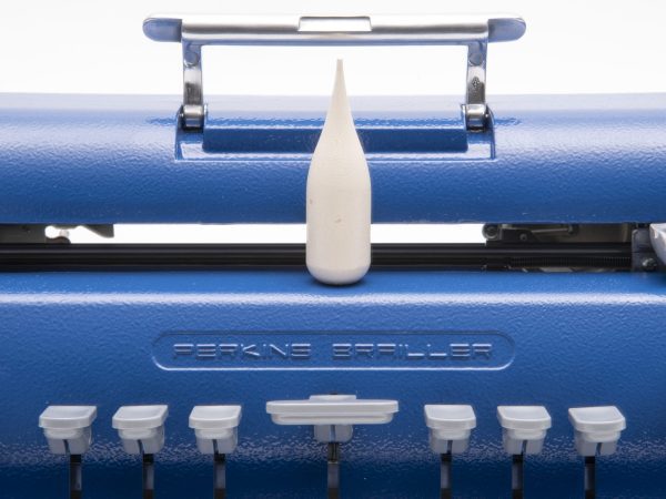 Perkins Brailler close up with handle and keys in view
