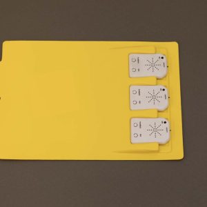 Digital-Recording-Devices-in-OTWL-Sound-Page - An overhead view of a OTWL yellow sound page with three white digital recording devices inserted.