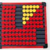 A top down shot of the EZeeCount Abacus with a mix of yellow and red dots.