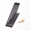 Open top view of Pocket Braille slate with wooden-handled stylus