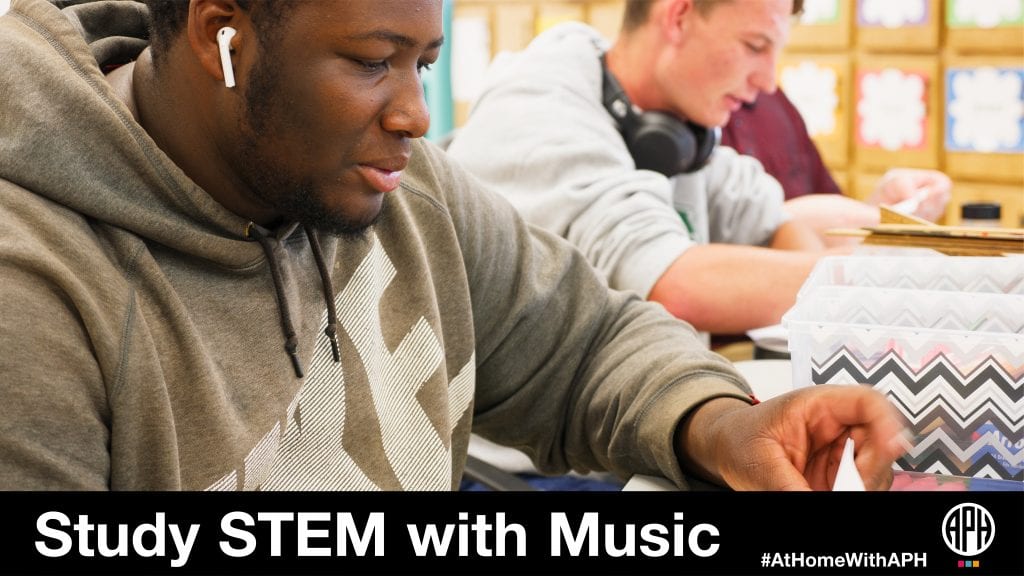 two teenage students in the classroom doing work with headphones. text reads