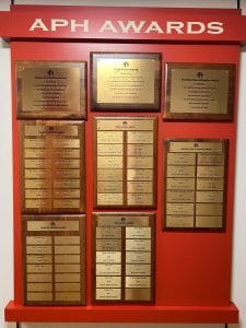 Display holding the various plaques that make up the "APH Awards"