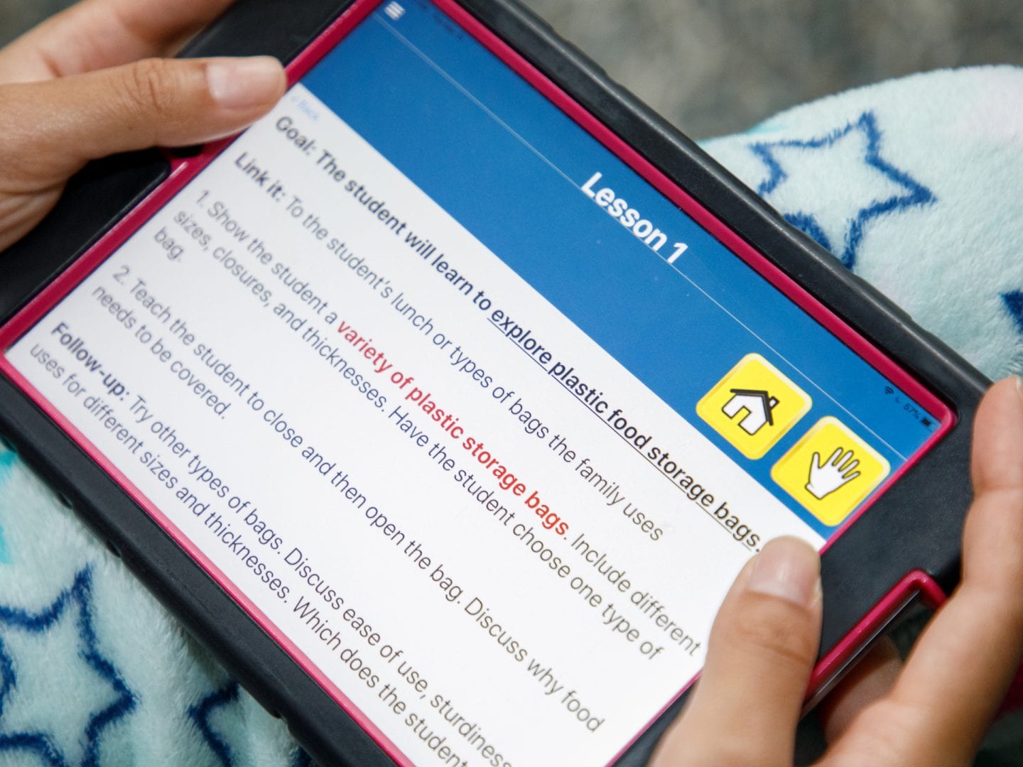Quick-and-Easy-ECC-On-Screen Hands holding a small tablet displaying the Quick and Easy ECC app