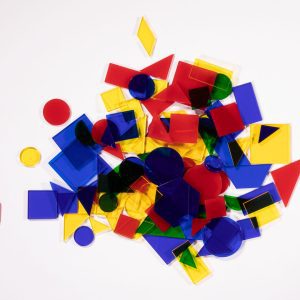 LED mini light box parquetry pieces. A pile of several translucent, colorful pieces.