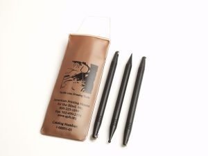 Three black line-drawing tools laid out parallel to the
