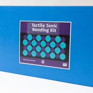 The blue storage box for Tactile Ionic Bonding Kit UEB. The sticker with the product name resembles the design on the front cover of the guidebook.
