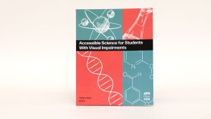 A copy of Accessible Science for Students With Visual Impairment on a white background. The cover is teal and salmon colored and features white line drawings of scientific diagrams.
