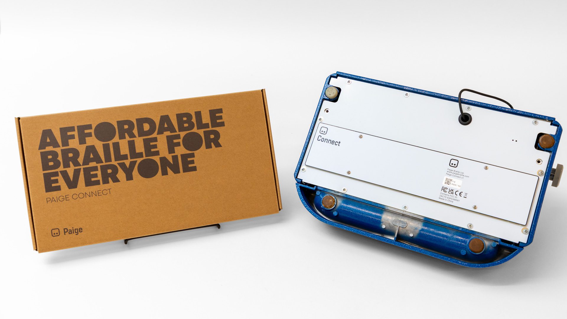 On the left sits the Paige Connect box, it reads "Affordable Braille for Everyone." On the right, a traditional braille writer has been flipped upside down to show the Paige Connect attached on the bottom.