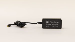 Neptune power cable on a white background. This cord is used to charge the Neptune.