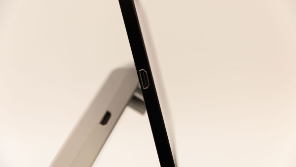 A close up of the right side of the Neptune showing two HDMI outputs, one on the device itself and one on the detachable monitor.