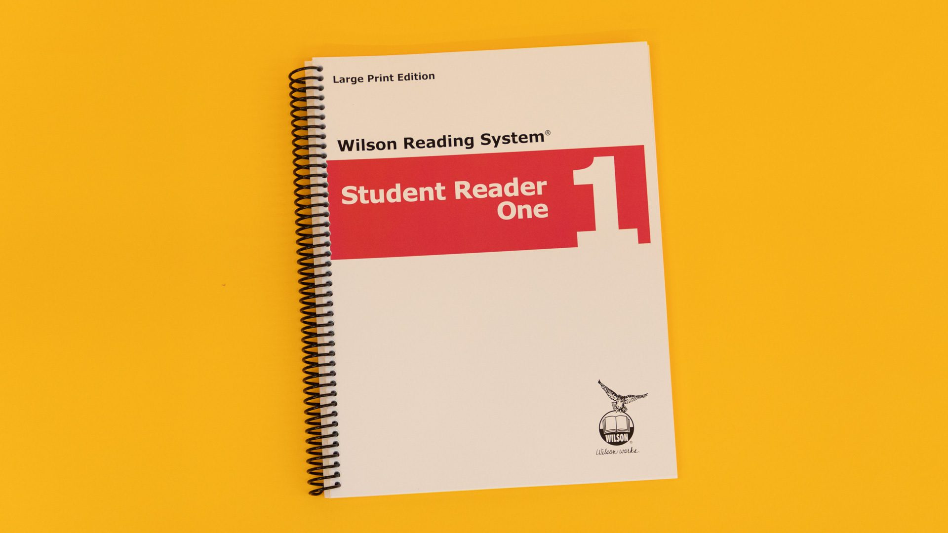 WRS-LP-Student-Reader-1_4Z9A1215-web The large print edition of the WRS student reader one with a red stripe across the cover.