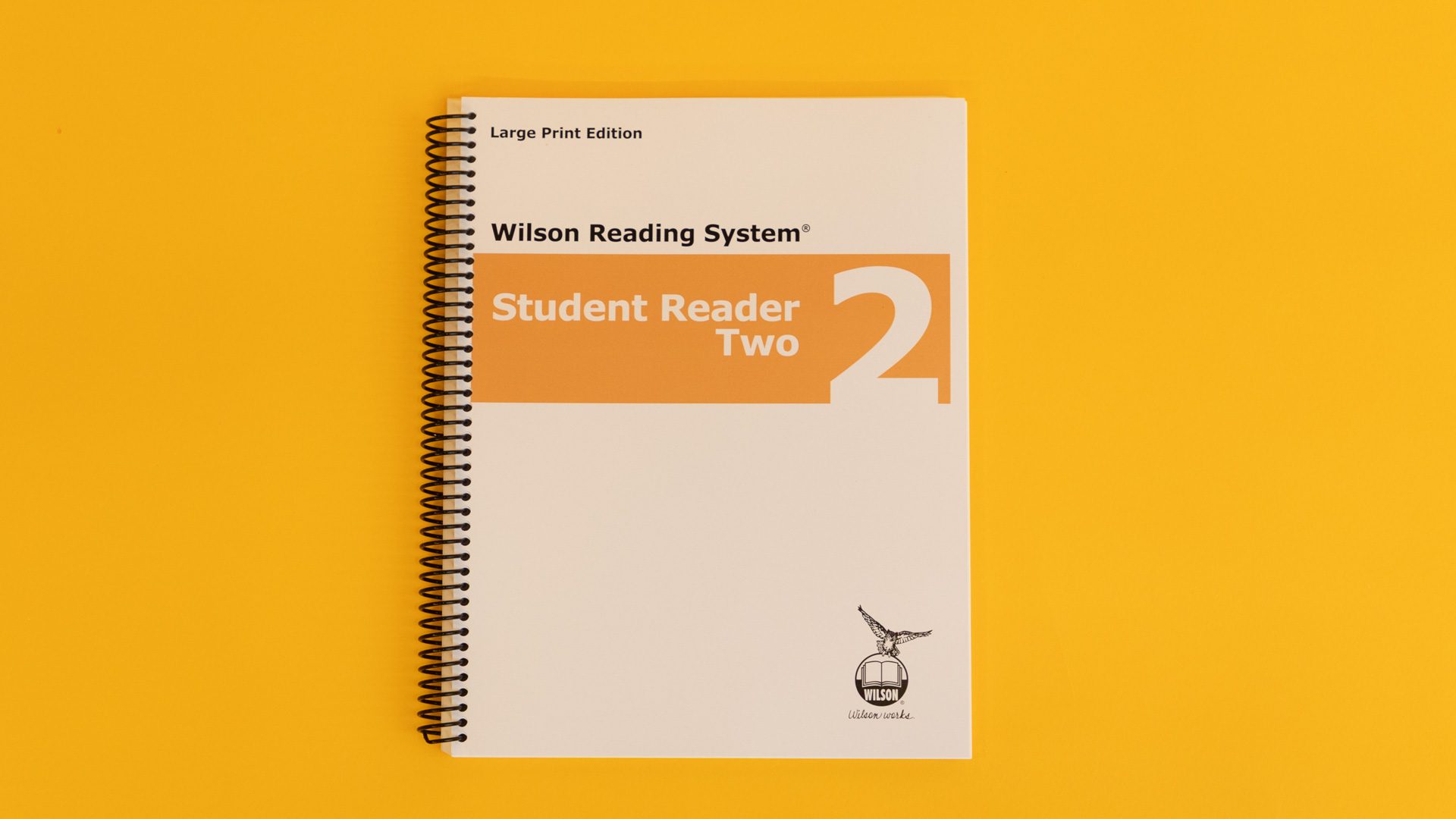WRS-LP-Student-Reader-2_4Z9A1235-web The large print edition of the WRS student reader two with a yellow stripe across the cover.