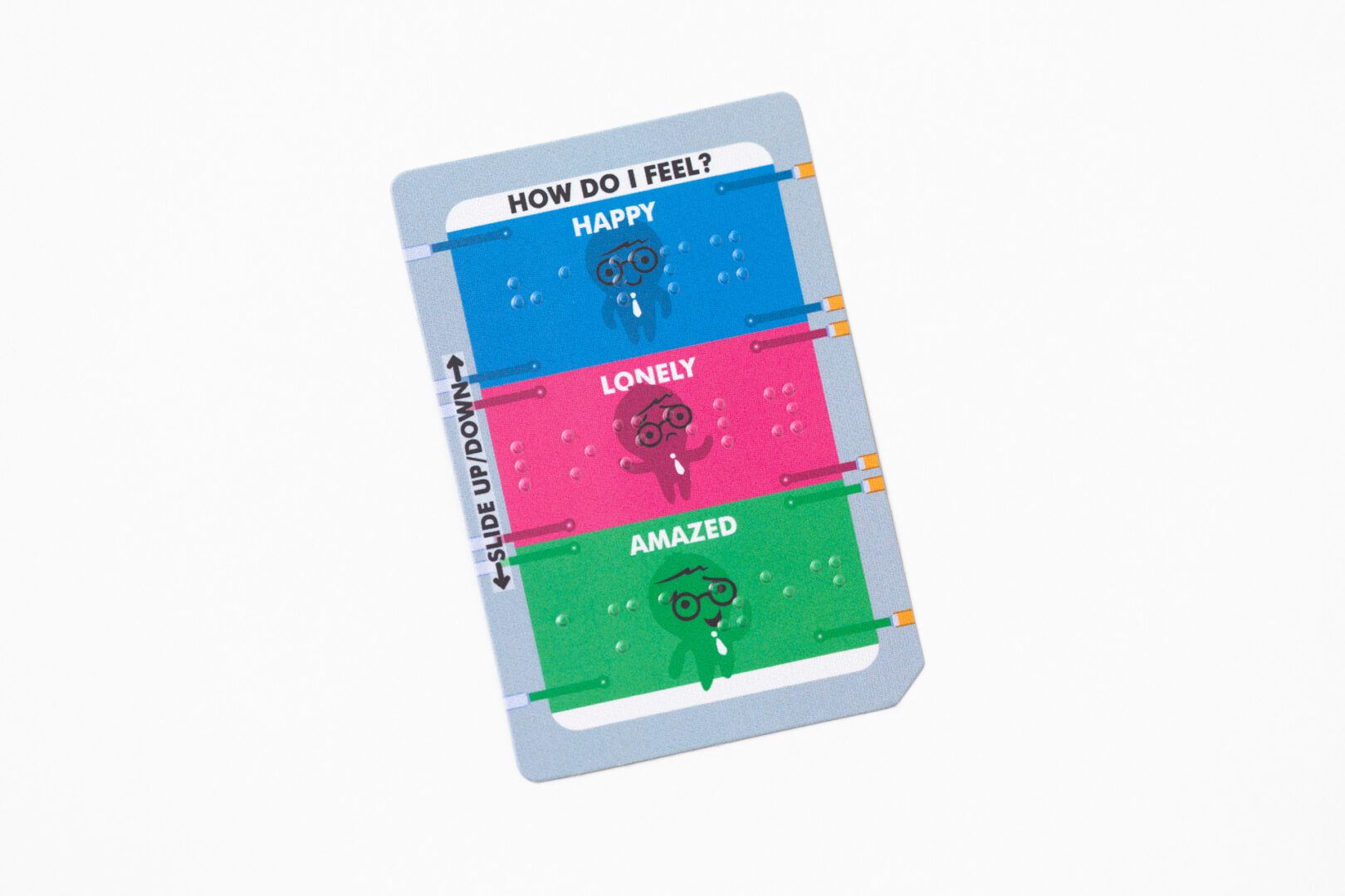 A braille card included with KaiBot that reads "how do I feel?" and lists happy, lonely, and amazed as options.